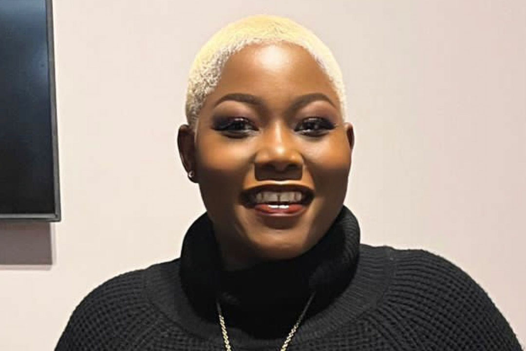 Headshot of Lecia Ellis in a black sweater